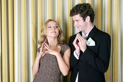 Becki Newton and Michael Urie 14x17